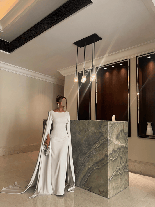 FITTED DRESS WITH EXAGGERATED SLEEVES