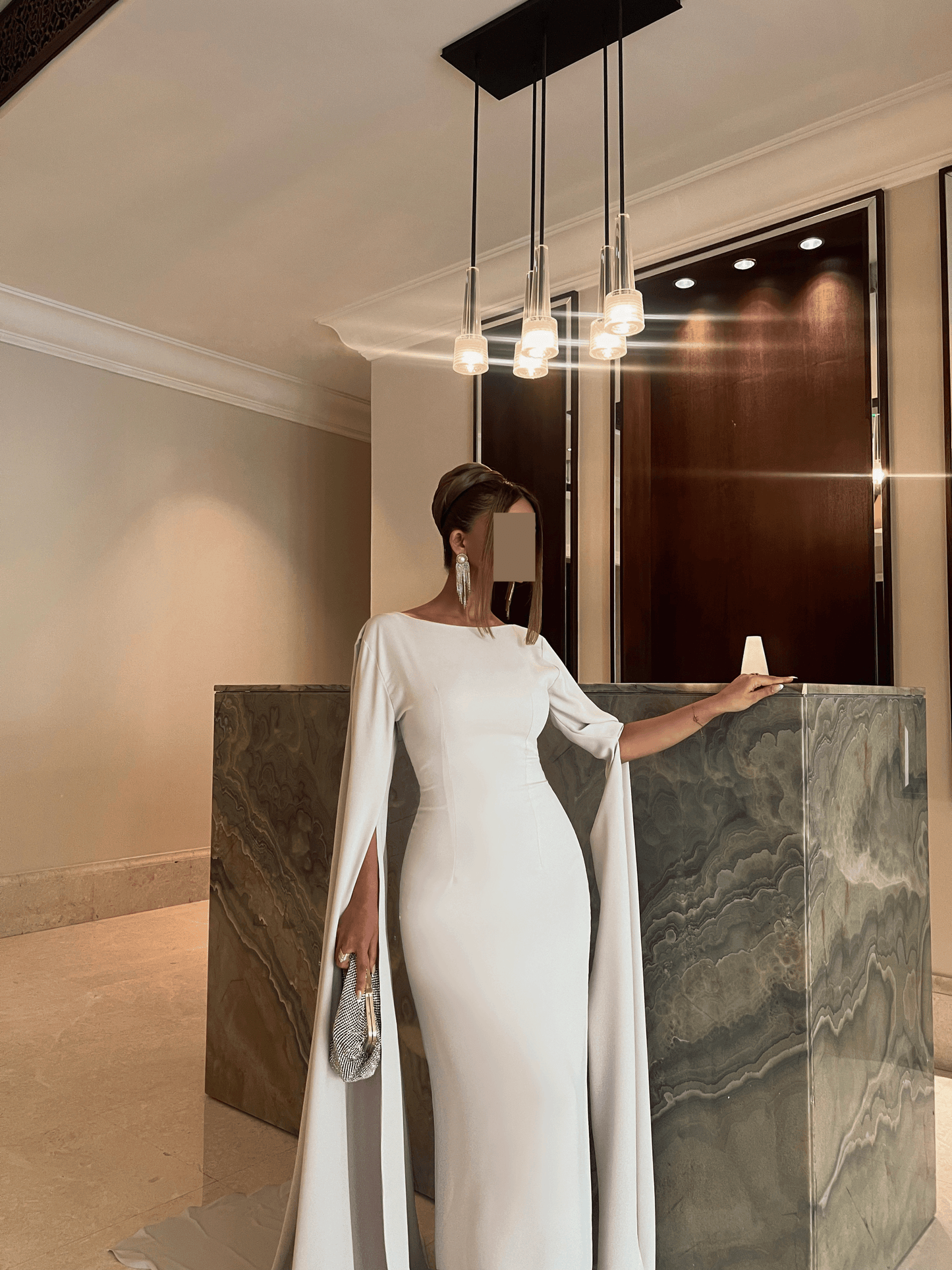 FITTED DRESS WITH EXAGGERATED SLEEVES